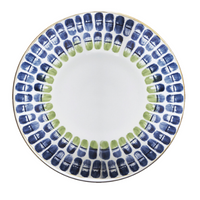 The Marie Daâge Marie Daage Ronde de Maille 1 is a round white Limoges porcelain plate with a hand-painted border of blue and green oval brushstrokes, showcasing exquisite tableware from Marie Daâge.