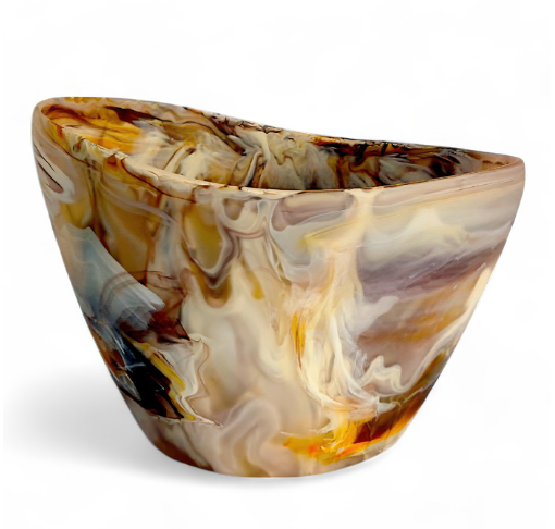 A sculpted vase with a marbled pattern in shades of brown, yellow, white, and gray against a plain white background captures the sophisticated aesthetic of resin tableware by Nashi Home, evoking the style of their Oceania Ice Bucket & Chiller Vessel – Mocha.