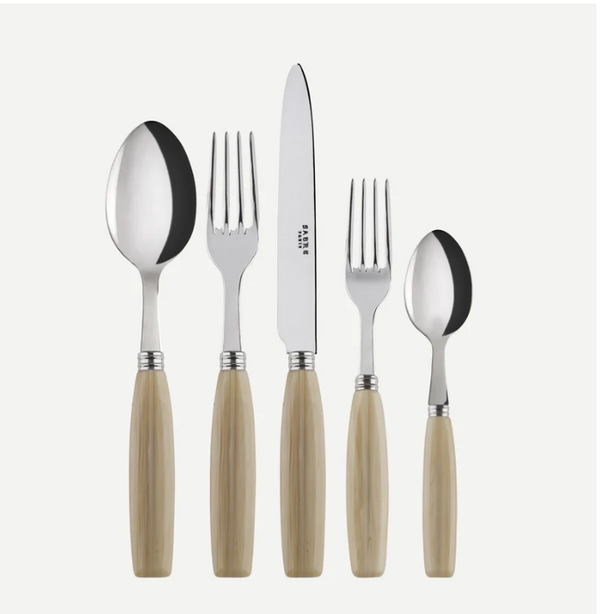 The Sabre Djembe Flatware 5 Piece Setting - Faux Horn features five dishwasher-safe utensils with beige ethnic-style handles, arranged side by side on a light background.