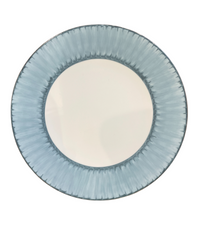 The Marie Daâge Ruban 1 Dinnerware by Marie Daâge features a round ceramic plate with a white center and a textured light blue, radial-patterned rim, shown from above against a white background.