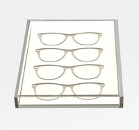 The Eye Candy Specs Eyeglass Tray is a clear rectangular acrylic holder displaying four pairs of eyeglasses frames in parallel rows on a white background, offering an elegant, luxury-inspired organization solution.