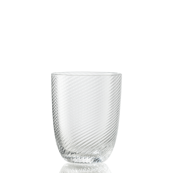 The Idra Tumbler Torse by Nason Moretti is a clear glass tumbler featuring a subtle diagonal textured pattern, presented against a plain white background.