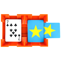 The Canasta Spinner by Canasta Sets is an orange cardholder holding three cards: the left shows the 7 of clubs, while the other two display blue backs with large yellow stars—an ideal accessory for canasta game nights.