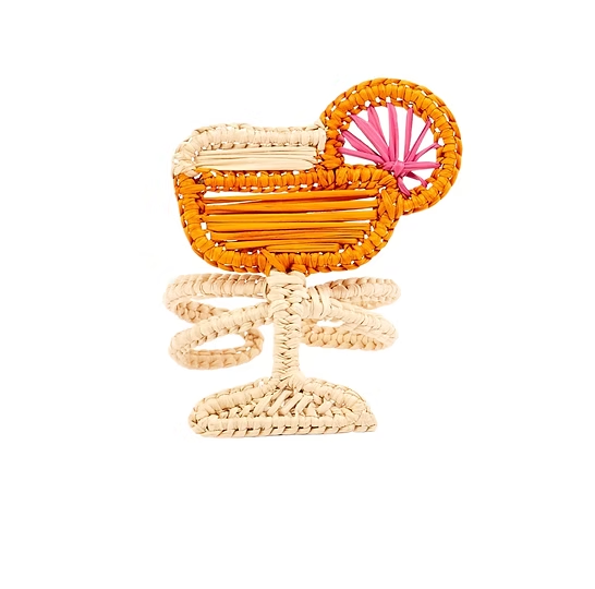 The Daiquiri Napkin Ring Set of 4 by Coro Cora features orange and beige woven cocktail glass shapes with pink and orange round garnishes, handcrafted in Colombia—an artisanal table decor accent on a white background.