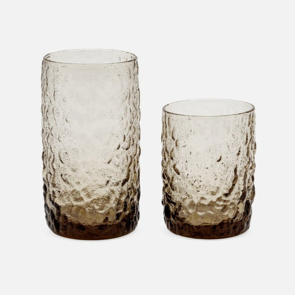 The Blue Pheasant Frederick Glassware Set of 6 in Chocolate features elegant hand-blown glasses, each with a unique textured design and brown gradient base, beautifully displayed on a plain white background.