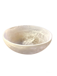 The Swirl Resin Classic Wave Bowl by Nashi Home is a round, shallow decorative bowl with smooth, curved sides in white marbled resin, shown on a plain white background.
