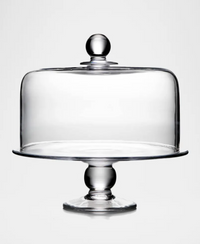 The Hartland Cakeplate and Dome Set by Simon Pearce is a clear lead-free glass cakeplate with a wide base and matching dome lid, elegantly designed and shown on a plain white background.