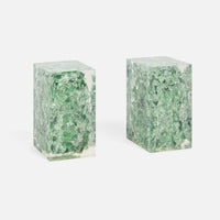 The Jessie Bookends Set by Made Goods features two rectangular resin bookends with embedded green glass shards—unique modern shelf accessories, beautifully displayed on a white background.