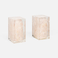 The Jessie Bookends Set by Made Goods features rectangular clear resin bookends filled with pink crystal clusters—a sparkling decorative accent for any shelf.