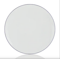 A round Monceau Bleu Outremer dinner plate by Raynaud, crafted from white Limoges porcelain with a thin, dark blue rim, displayed on a white background.