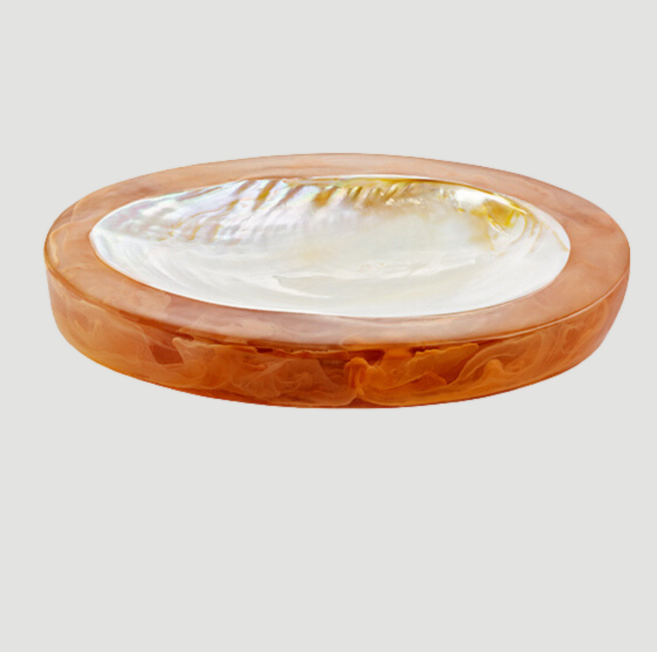 The Lily Juliet Caviar Dish Large - Sand is a round, shallow resin dish handmade in Vietnam, with a marbled sand outer rim and glossy pearlescent white interior, shown on a plain light gray background.