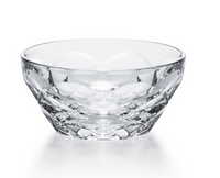 The Baccarat Swing Bowl features a clear, intricately faceted geometric design, ideal as modern brunch tableware. Shown against a white background.