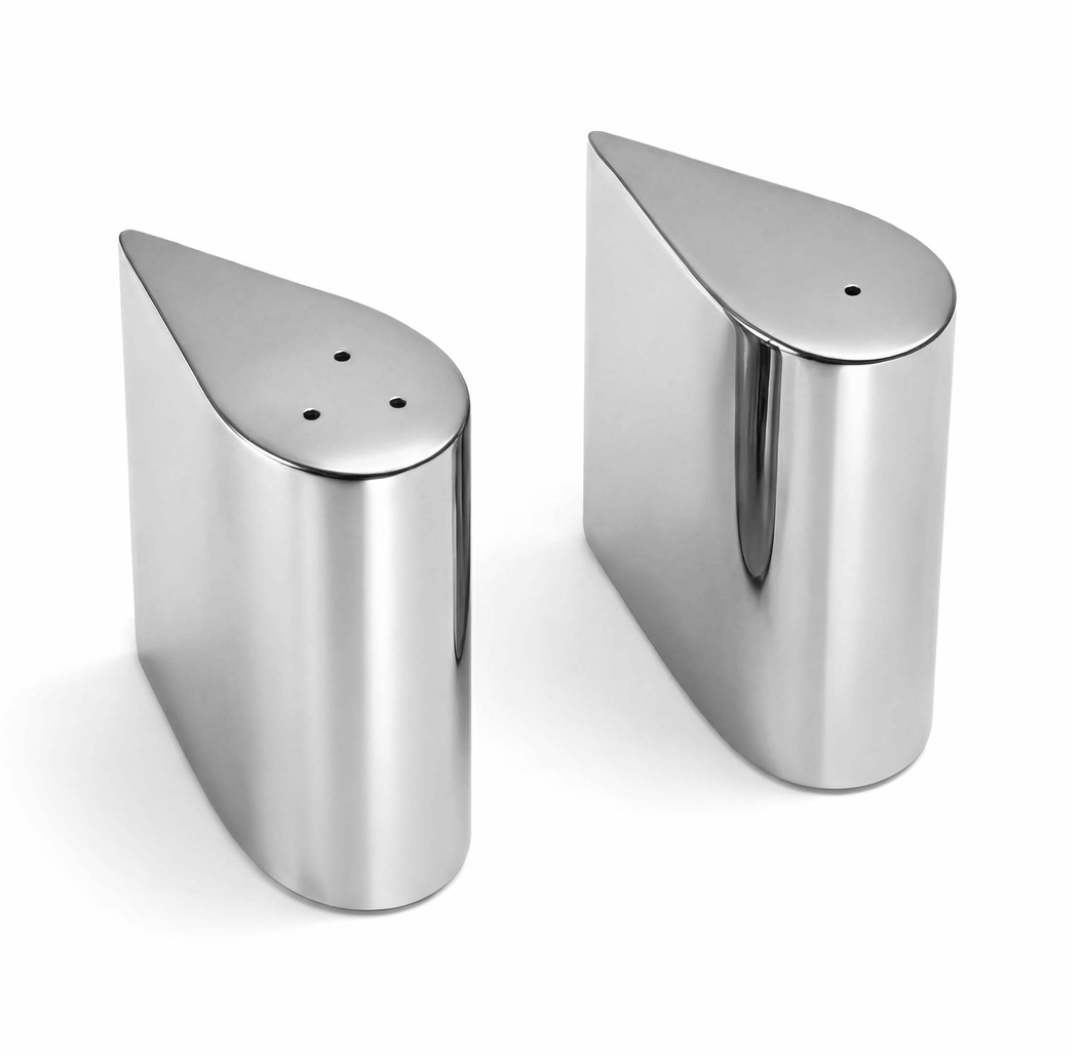Two silver, droplet-shaped Droplet Salt & Pepper Shaker - Silver sets embodying modern sophistication.