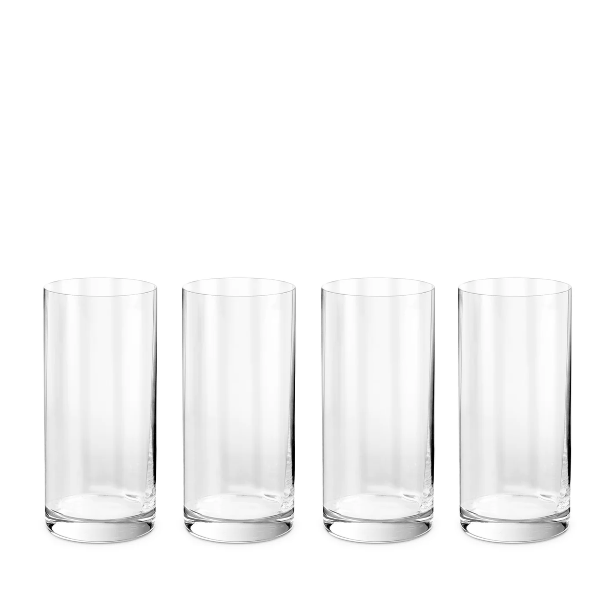 Four empty, clear tumblers from the L'Objet Iris Drinkware Collection are arranged in a straight line on a white background.
