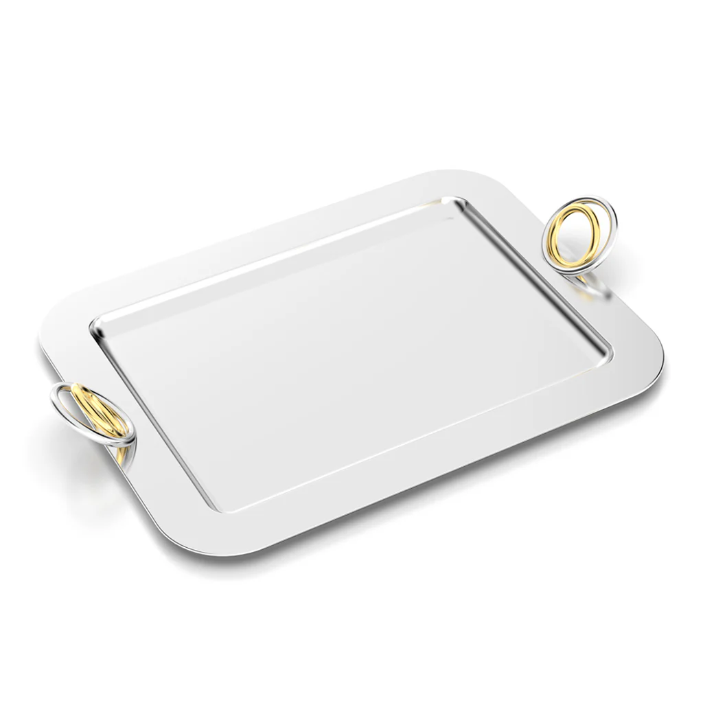 The Anna New York Ring Rectangle Serving Tray is a polished silver tray with rounded corners and two decorative gold and silver ring handles, perfect for stylish entertaining.