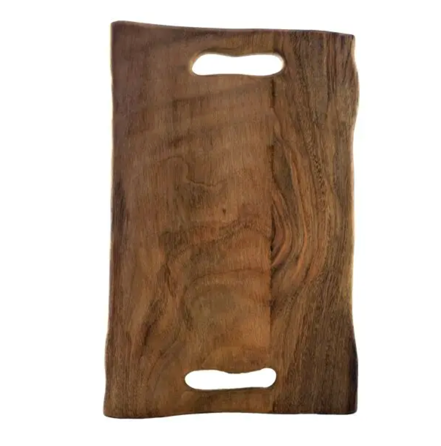 Introducing the Caro Wood Cheese Board by Sobremesa—a handmade rectangular board featuring rounded corners, two oval cutout handles on opposite ends, and striking natural wood grain patterns. Crafted from premium materials, this sustainable cheese board is both beautiful and functional, making it an ideal choice for eco-conscious cooks in any kitchen.