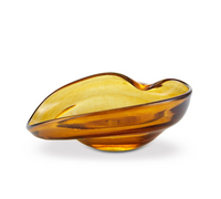 Aura Small Catchall Bowl by Yakush—handmade from recycled, amber-colored glass with an organic, asymmetrical form, smooth contours, and a glossy finish—serves beautifully as a jewelry catchall and is shown on a white background.
