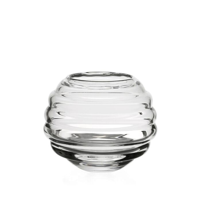 The Ripples Rose Bowl by William Yeoward is a clear, round vase with horizontal ridges forming a beehive-like shape, displayed against a plain white background.