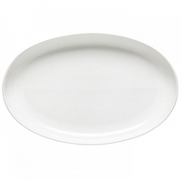 The Casafina/Costa Nova Pacifica Salt Dinnerware plate is oval-shaped stoneware with a smooth matte finish, shown from above on a white background.