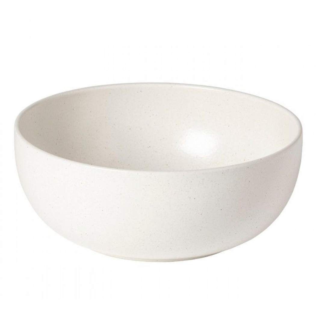 The Casafina/Costa Nova Pacifica Salt Dinnerware bowl, featuring a plain, round shape and smooth matte off-white stoneware finish, is displayed against a white background.