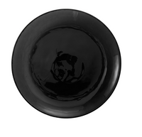 A glossy, round, black ceramic plate from the Fortessa Los Cabos Shadow Dinnerware 4 Piece set is shown empty and photographed from above against a white background, highlighting its smooth, reflective surface.