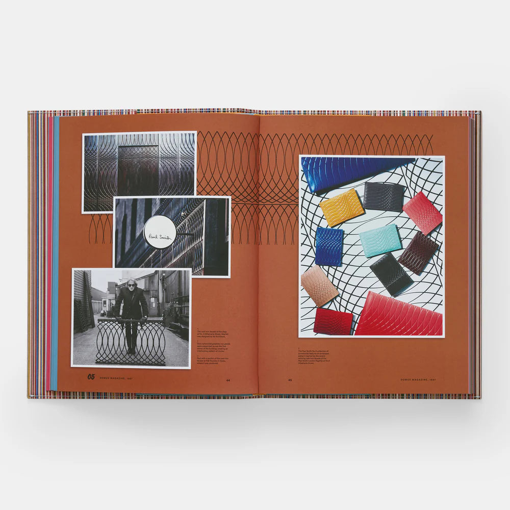 An open Paul Smith book by Phaidon/Hachette features a rust-red spread with black geometric lines and black-and-white British fashion photos on the left, while colorful wallets are displayed on a patterned surface to the right.