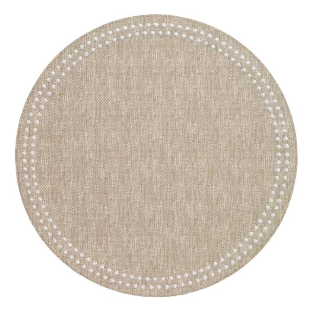 The Bodrum Pearls Round Placemat Set of 4 in beige features a subtle fabric texture and white dotted border near the edge, crafted from phthalate-free vinyl for safe, stylish dining.