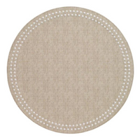 The Bodrum Pearls Round Placemat Set of 4 in beige features a subtle fabric texture and white dotted border near the edge, crafted from phthalate-free vinyl for safe, stylish dining.