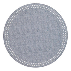 The Bodrum Pearls Round Placemat Set of 4 in light blue features a subtle textured design and a border of small white dots, adding modern charm to any table—perfect for an elegant, embroidered placemat style.