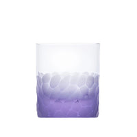 The Pebbles DOF 370 ml by Moser is a hand-blown, lead-free Czech crystal whisky tumbler featuring a textured frosted gradient in light purple on the lower half and a smooth, transparent upper half.