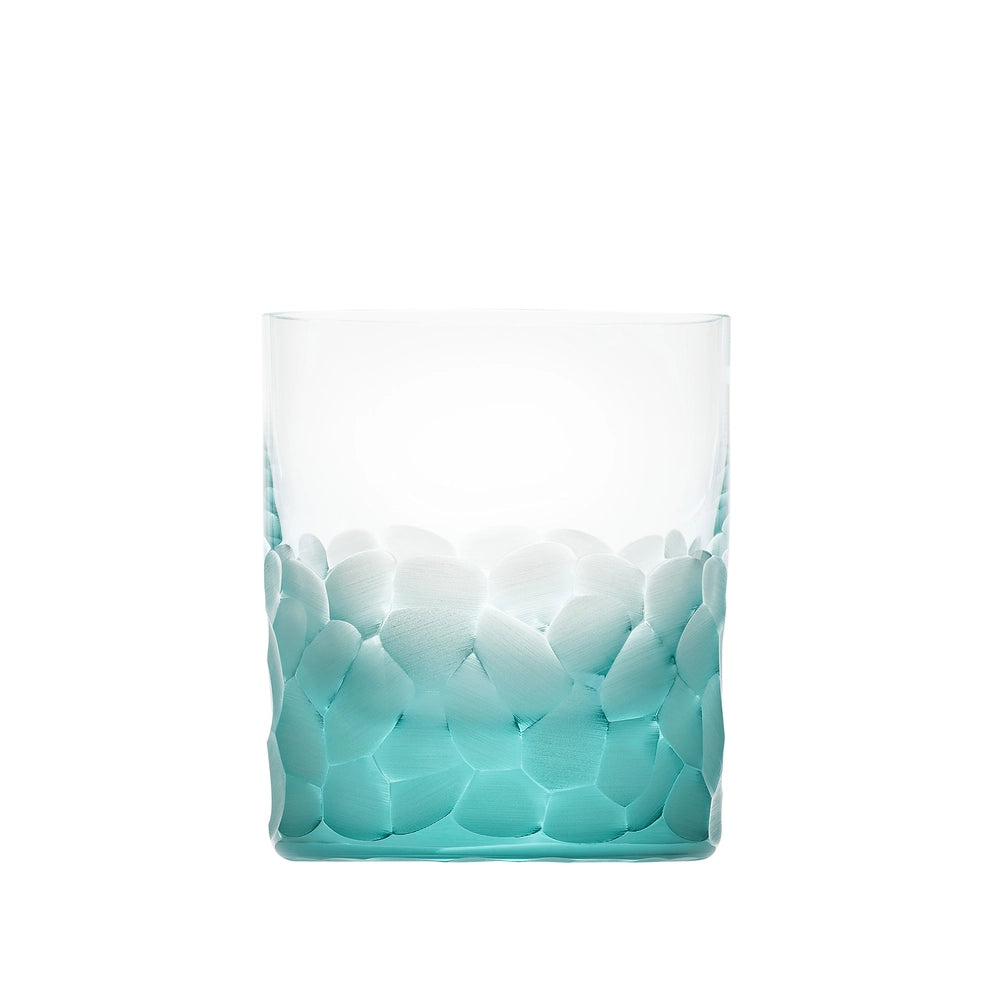 The Moser Pebbles DOF 370 ml is a hand-blown glass whisky glass featuring a textured pattern of frosted white and light turquoise rounded shapes at the base that gradually fade upward.