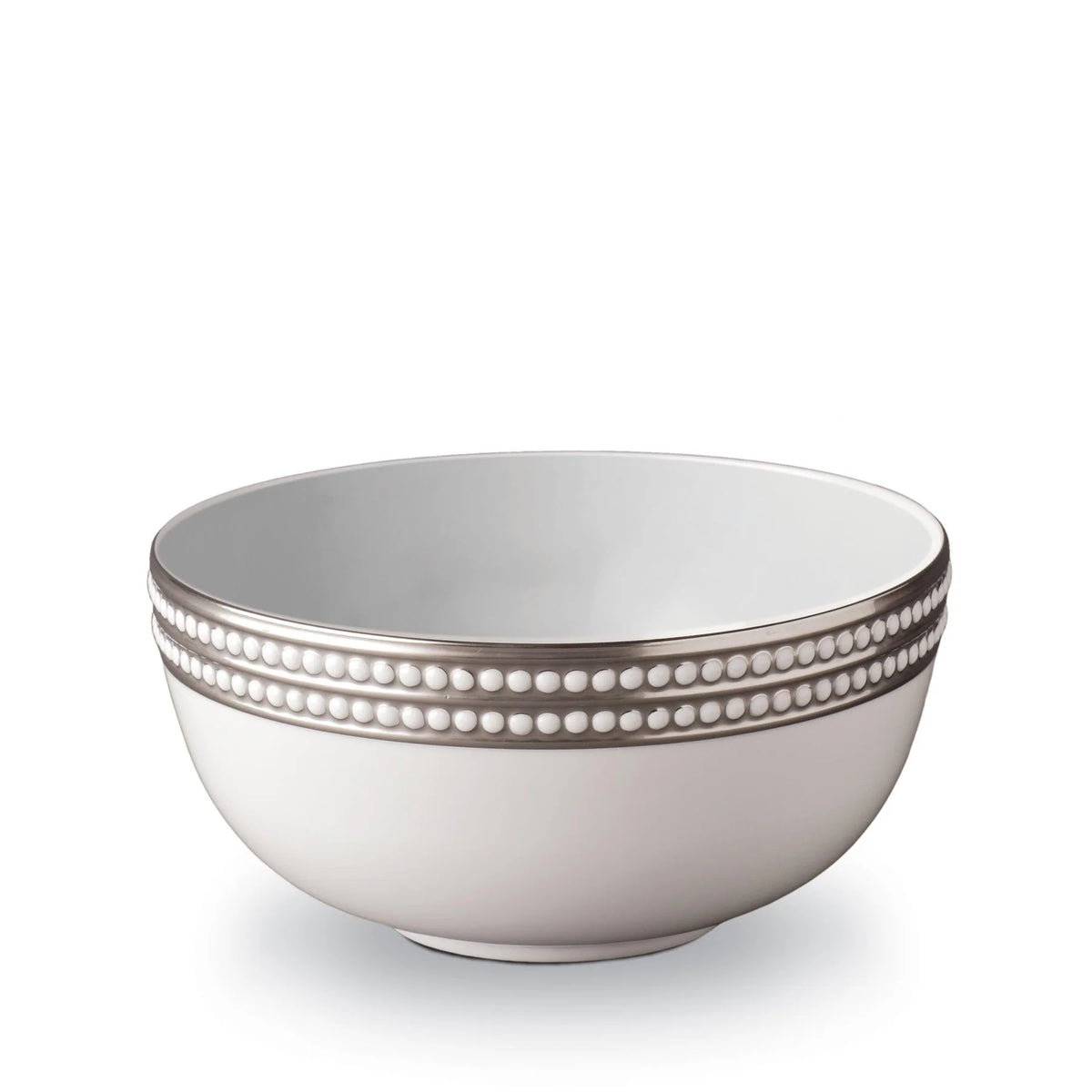 The L'Objet Perlée Platinum Dinnerware bowl features white porcelain with a platinum rim and raised white dot accents, shown against a plain white background.