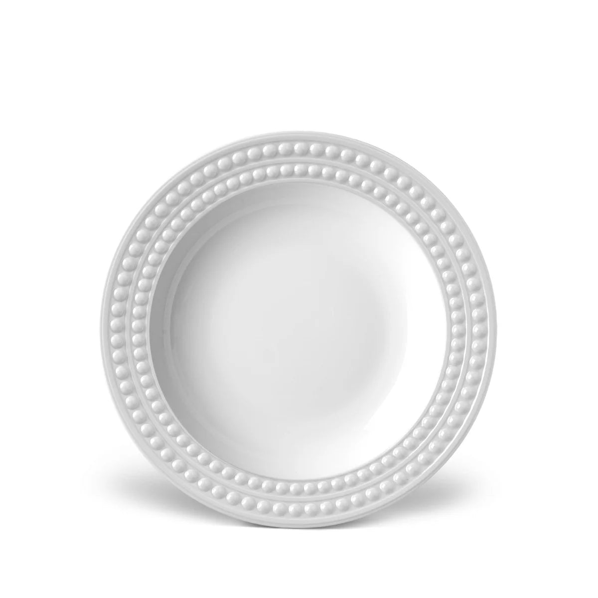 The L'Objet Perlèe White Dinnerware charger plate features a raised beaded rim design in white ceramic, shown on a plain white background.