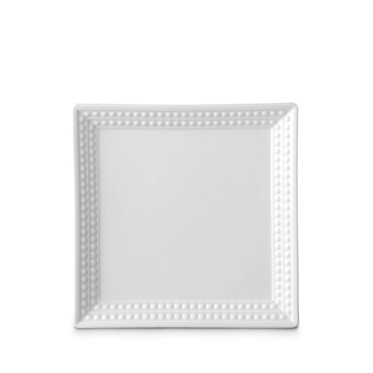 A square white ceramic charger plate with a raised beaded border from L'Objet's Perlèe White Dinnerware, shown against a plain white background.