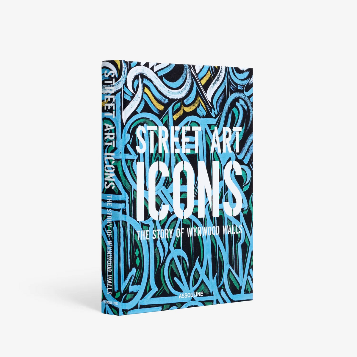 Street Art Icons (Wynwood Walls) by Assouline, with a blue and black abstract graffiti-style cover, stands upright against a white background—a vivid homage to street art and urban renewal.