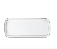 The Bernardaud Dune Dinnerware platter is a rectangular white Limoges porcelain piece with rounded corners and a subtle textured silver border, shown on a plain white background.
