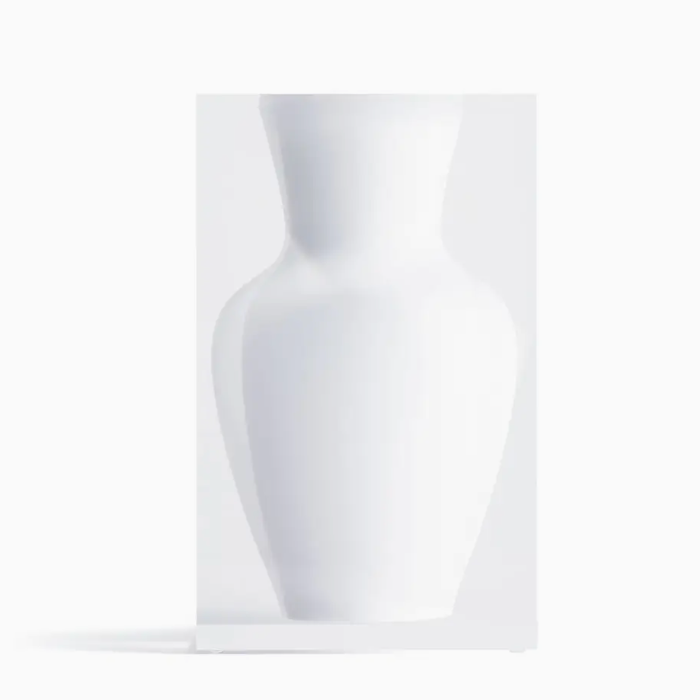 From the JR William Lucite Vase Collection, this white ceramic vase features a smooth, curved design inspired by Marble Lucite Vases, showcased against a plain background with a soft left-cast shadow.