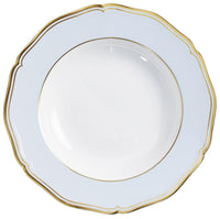 A Raynaud Mazurka Gold & Blue Grey Dinnerware white porcelain plate, featuring scalloped edges and gold trim on the rim and inner border, is empty and viewed from above against a white background.