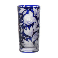 Deep blue Artel Verdure Highball Jewel Colors glass featuring an intricate, etched botanical design of pomegranates and leaves.