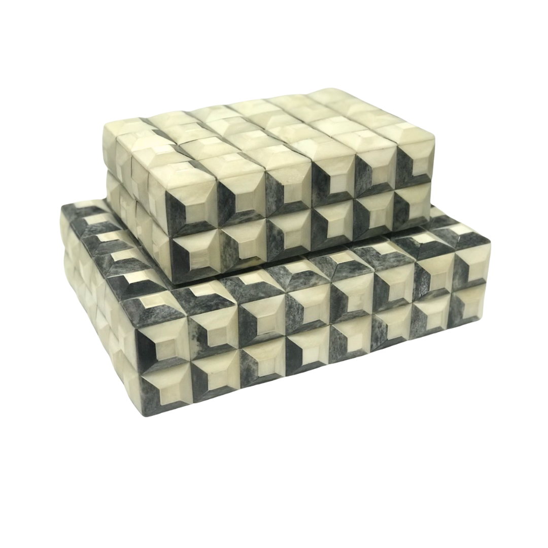 Two Bojay Checkmate Box Grey Small organizers, stacked, display a bold black and white 3D cube pattern with a glossy finish—ideal for compact storage and adding an optical illusion effect to your decor.