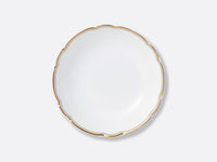 The Pompadour plate by Bernardaud is a round white porcelain piece with a scalloped edge and thin gold rim, shown from above on a light gray background, evoking classic Limoges France style.