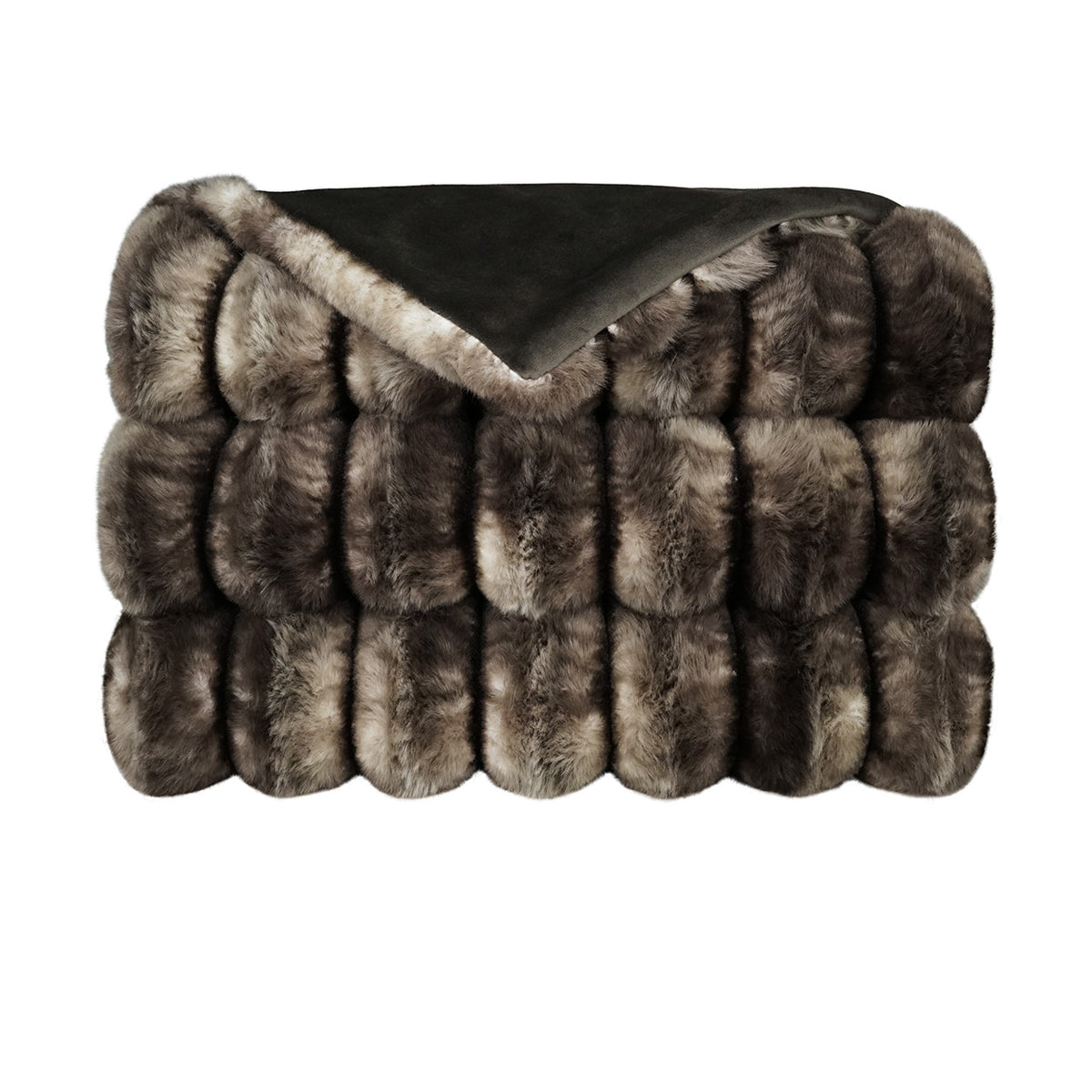 The Summit Throw by D.V. KAP / Canaan Company features luxurious faux fur in rich brown and gray tones, showcasing plush texture with one corner flipped to reveal a soft, dark underside.