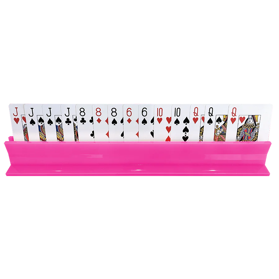 The Canasta Sets Canasta Rack is a pink card holder that stylishly displays playing cards, including Jacks, 8s, 6s, 10s, and Queens—a charming accessory for your canasta games.