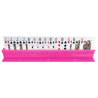 The Canasta Sets Canasta Rack is a pink card holder that stylishly displays playing cards, including Jacks, 8s, 6s, 10s, and Queens—a charming accessory for your canasta games.
