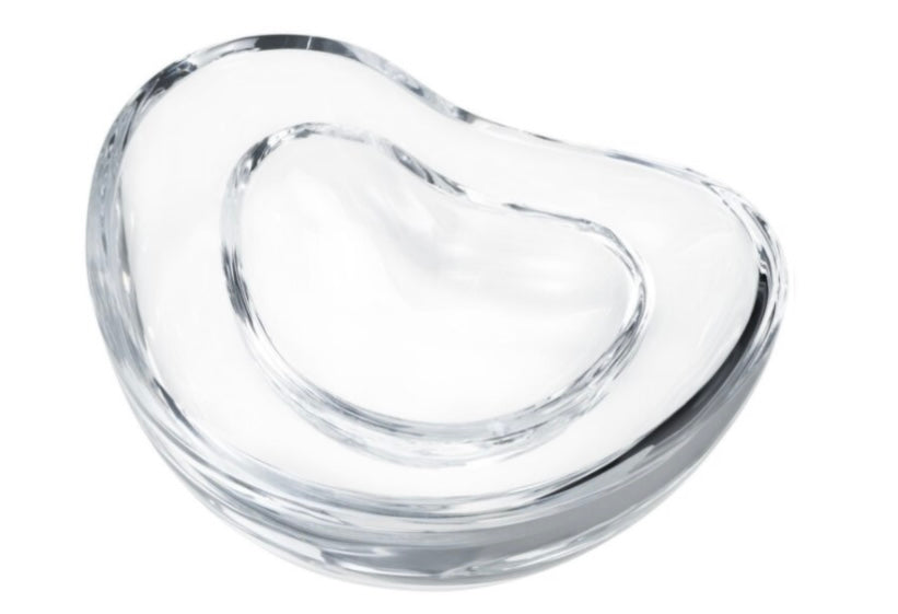 The Georg Jensen Indulgence Caviar Dish features a clear glass bowl with a rounded, organic shape and inner lip, showcasing the brand’s signature elegant design.