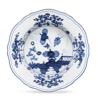 Ginori 1735 Oriente Italiano Indaco scalloped Antico Doccia porcelain soup plate featuring blue floral and landscape patterns on a white background.