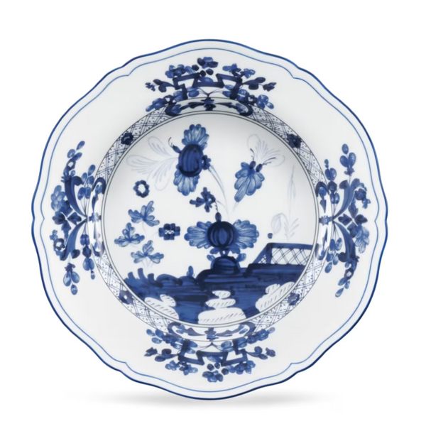 Ginori 1735 Oriente Italiano Indaco scalloped Antico Doccia porcelain soup plate featuring blue floral and landscape patterns on a white background.