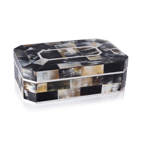 The Zodax Villagio Horn Box Black & Ivory is a handcrafted rectangular storage box with a hinged lid, featuring polished black and ivory horn tiles in a geometric pattern for stylish organization.
