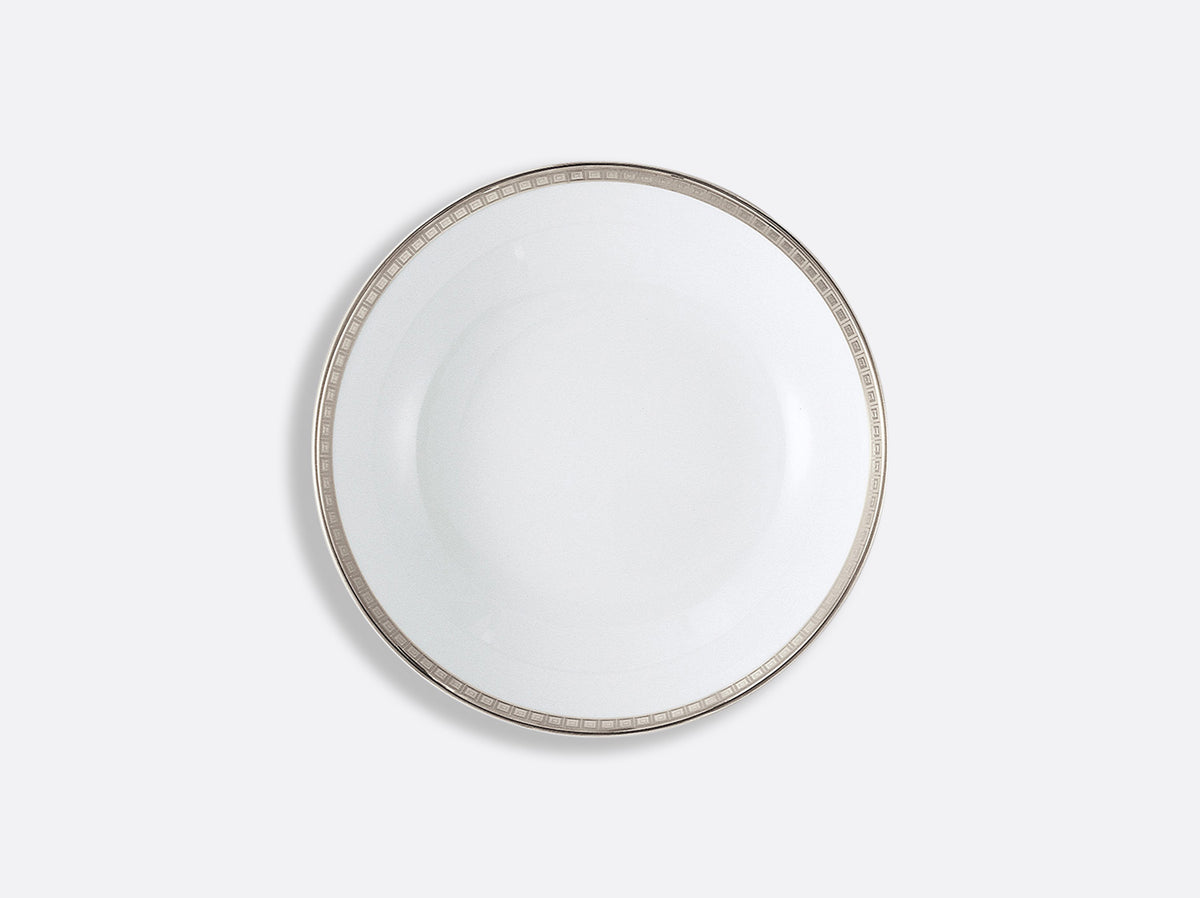 A Bernardaud Athena Platinum Dinnerware plate with a simple metallic rim is photographed from above on a plain light gray background.