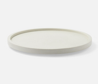 The Blue Pheasant Calvin Faux Shagreen Lazy Susan White is a simple, round, off-white tray with a slightly raised rim, shown against a plain white background.